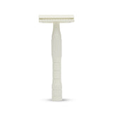 Image of a cream safety razor on a white background.